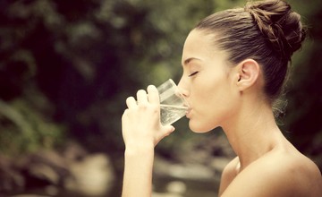young-woman-drinking-water-from-a-glass-4